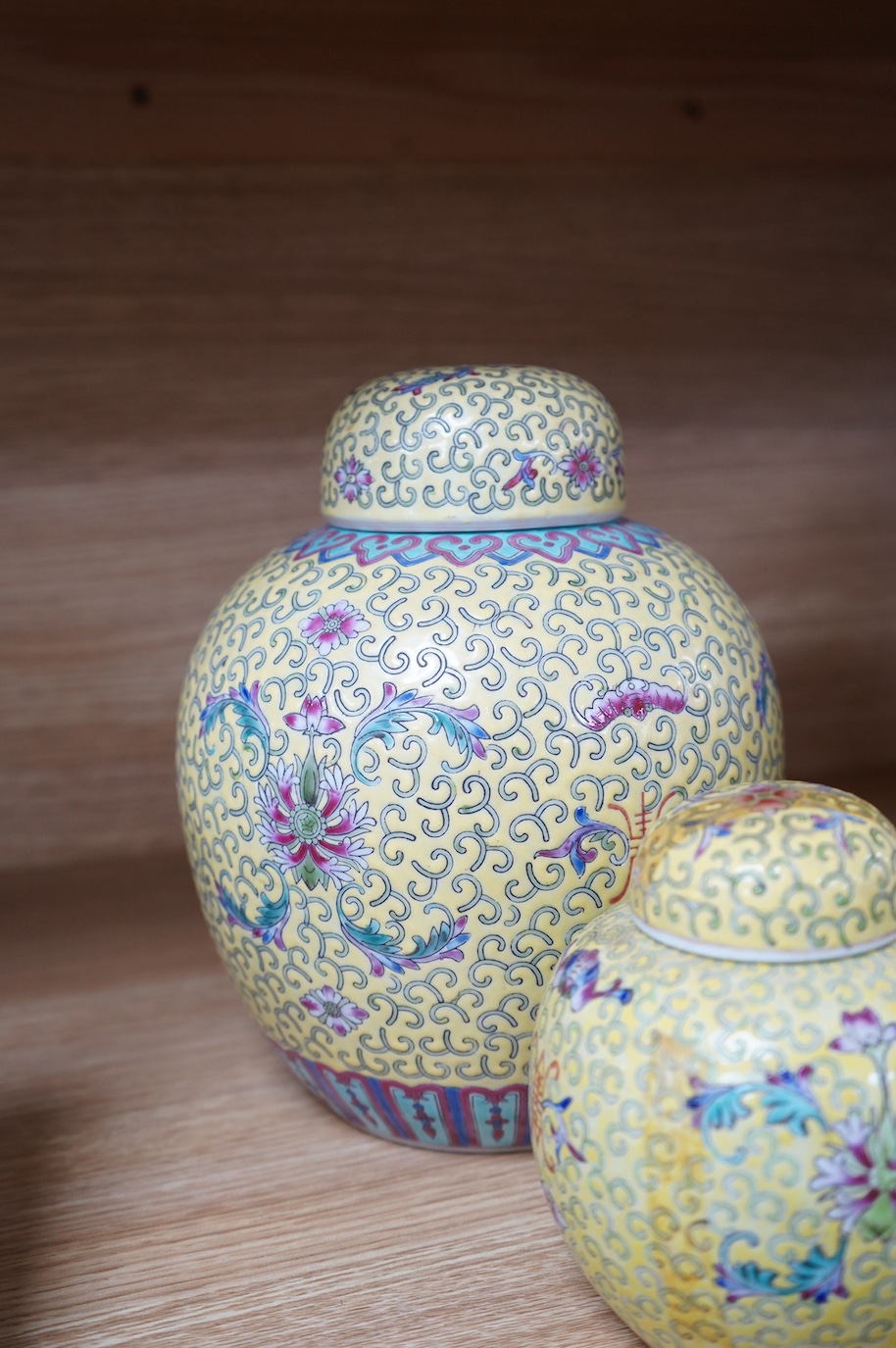 Two Chinese yellow ground ginger jars and similar vase. Condition - fair to good